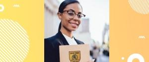 person holding a folder smiling